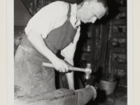 One person with a hammer