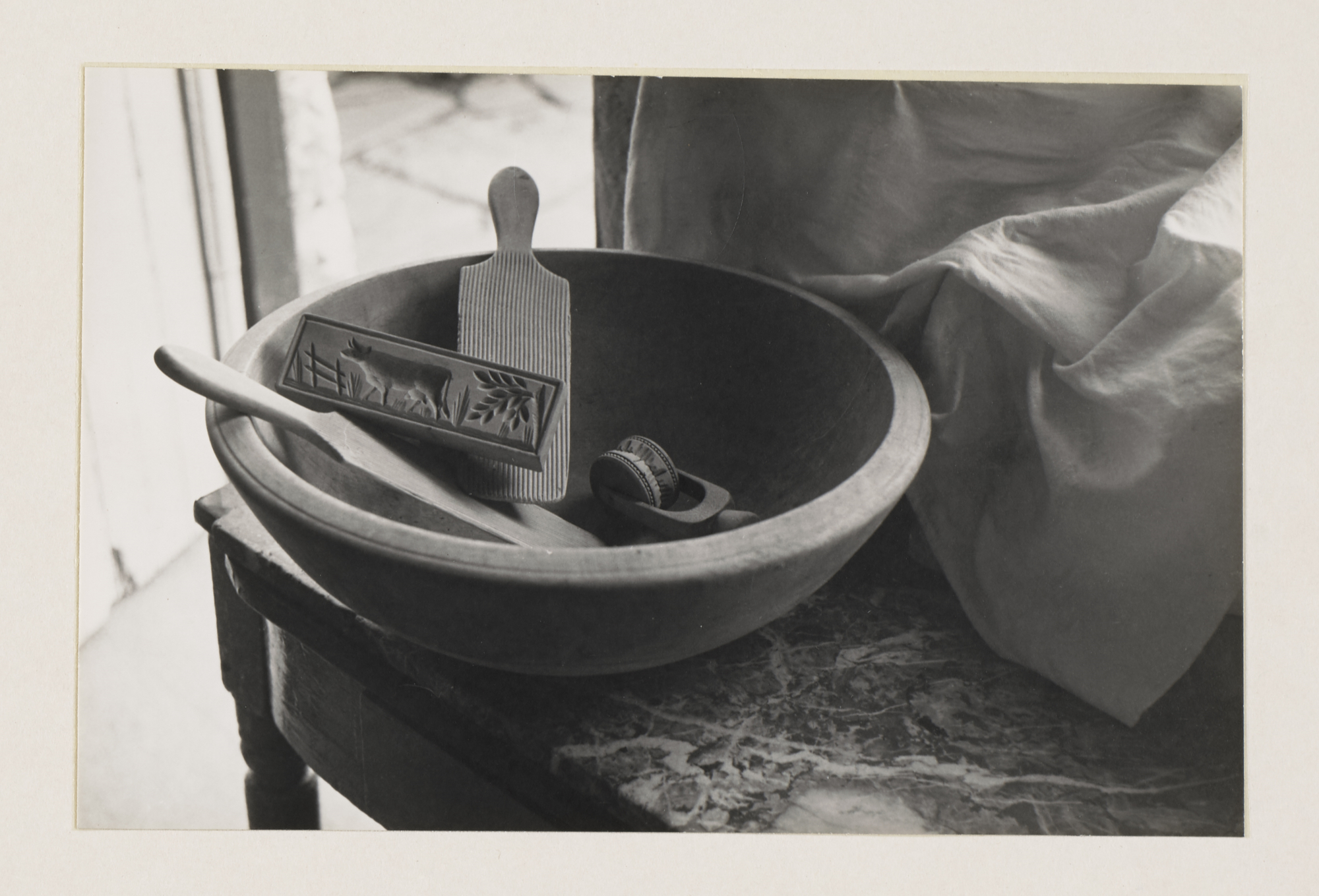 A bowl and wooden tools