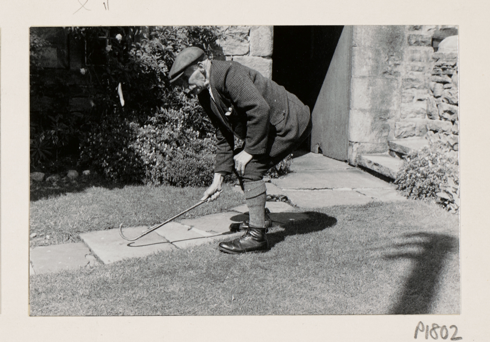 A person holding a stick