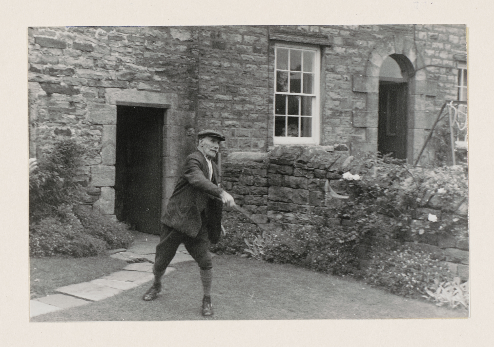 A person standing outside a building