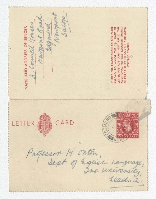 A handwritten postcard