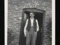 A person standing in front of a door