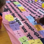 child looking at table.