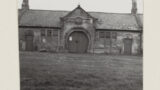 Blacksmith's shop with horseshoe-shaped doorway, in Roxby (North Yorkshire).